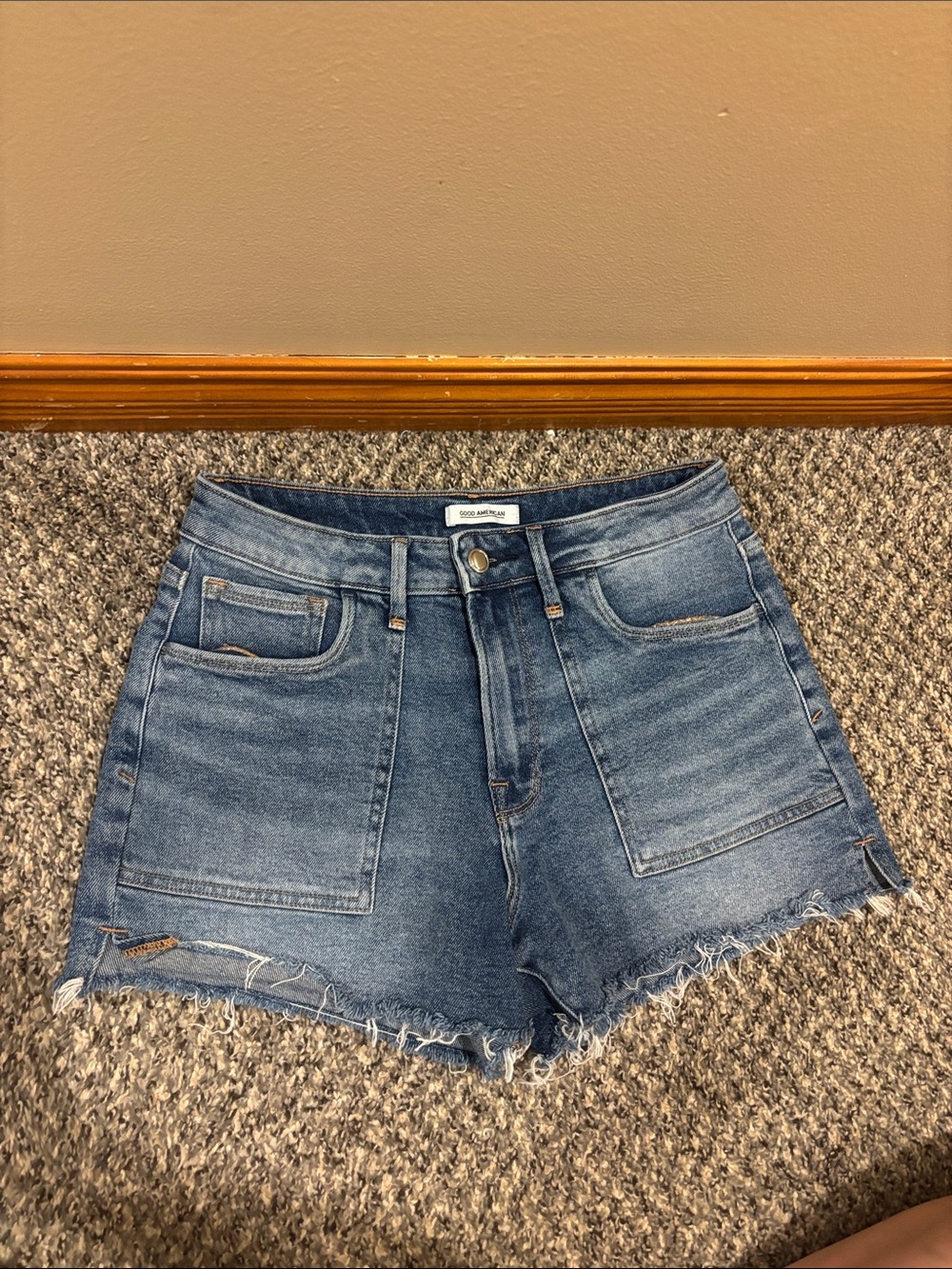 Good American Medium Blue High-Rise Frayed Pocket Denim Shorts